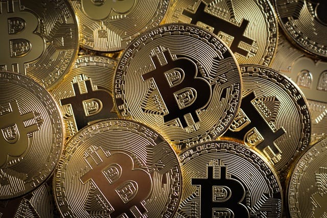 Screen is filled with gold Bit Coin Coins
