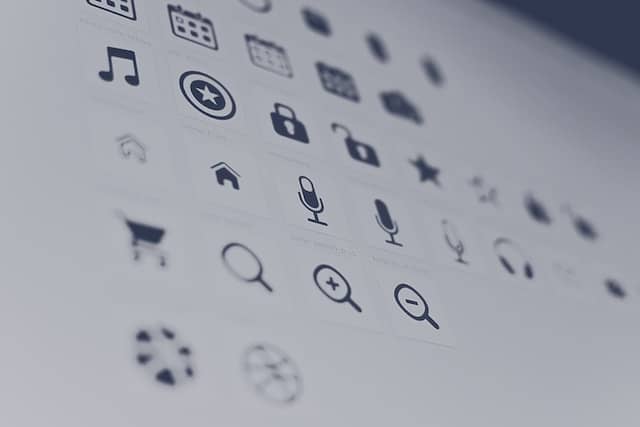 A closeup of a computer monitor which has icons displayed.